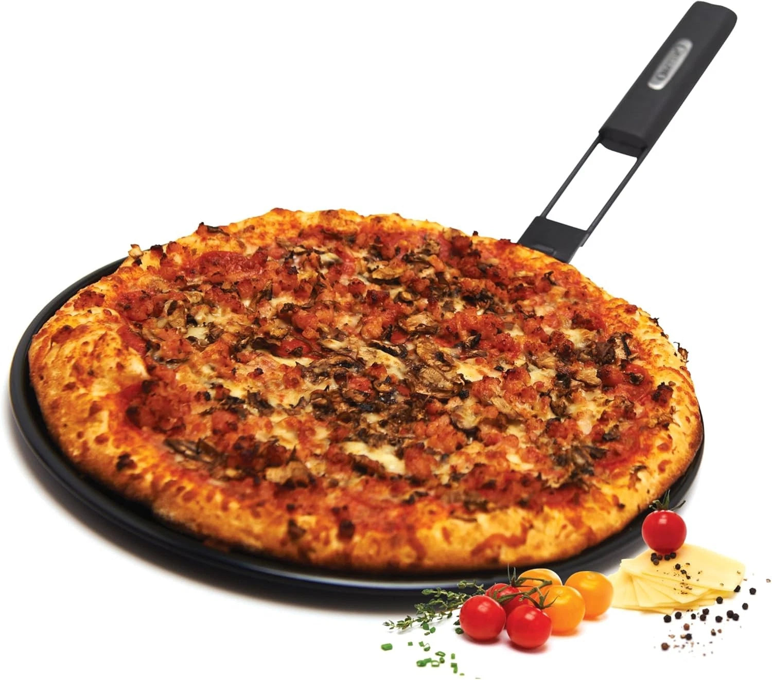Pizza on a pan with a spatula, surrounded by vegetables on a white background